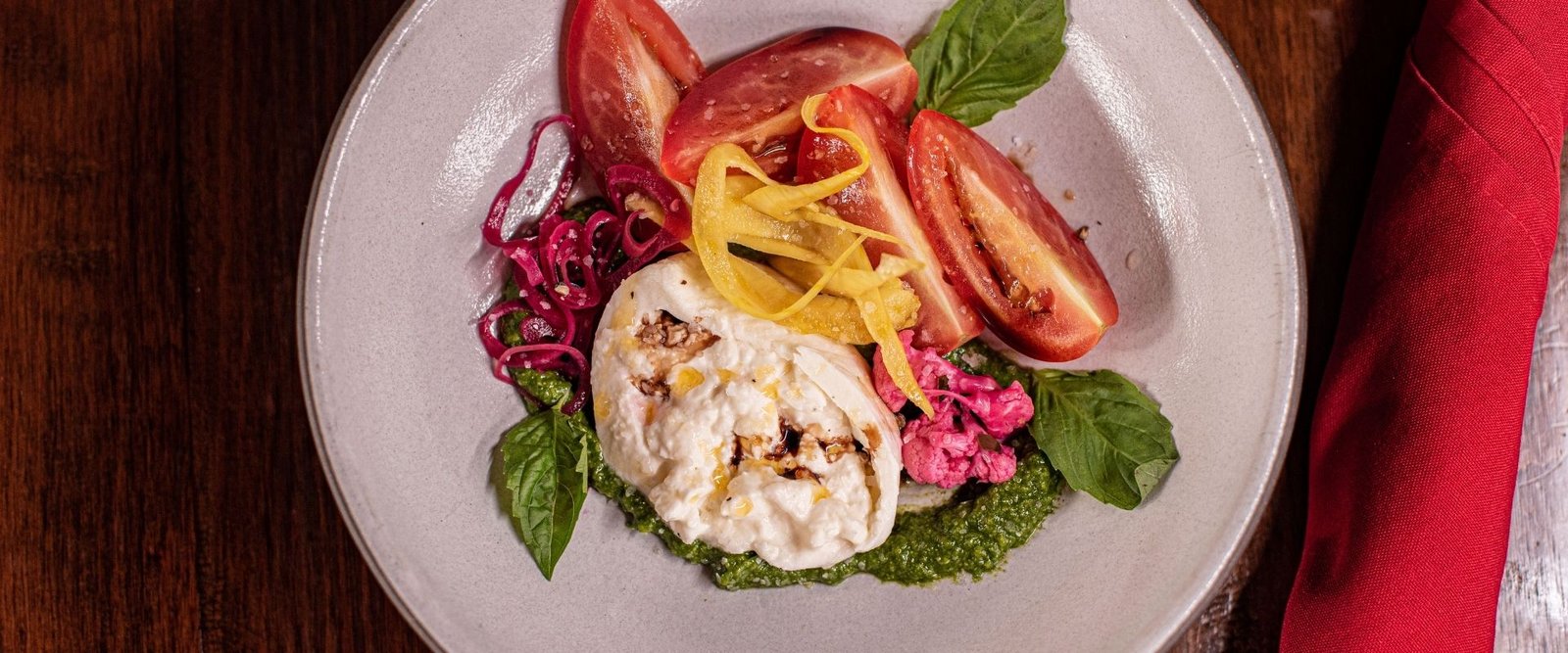 Caprese Salad with Burrata, Roma Tomato, Pistachio Pesto, Pickled Vegetables (Gluten Free and Vegetarian) at Red Cork Bistro in Mukilteo Caprese Salad with Burrata, Roma Tomato, Pistachio Pesto, Pickled Vegetables (Gluten Free and Vegetarian) at Red Cork Bistro in Mukilteo