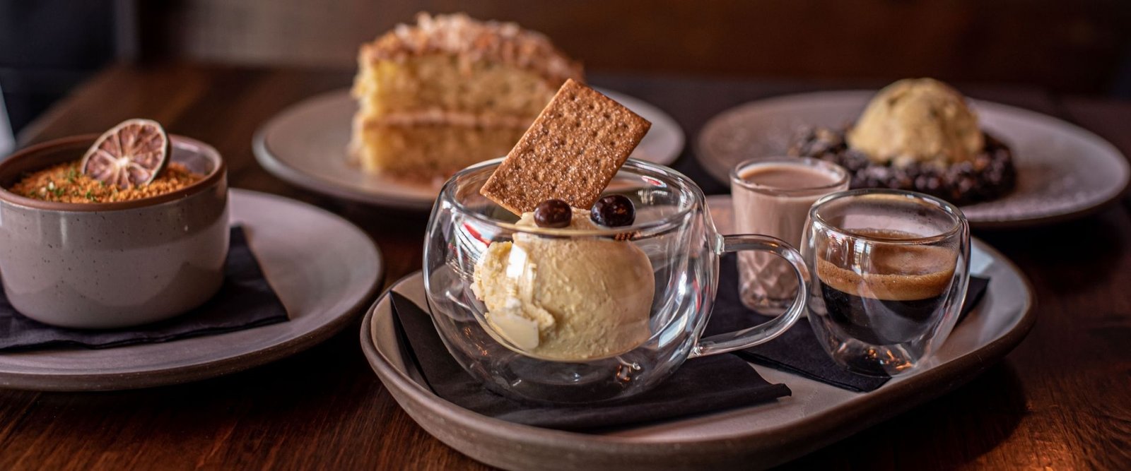 A Delicious Selection of Desserts, including Affogato, Key Lime Mousse, Coconut Crème Cake, and Warm Chocolate Cookie at Red Cork Bistro in Mukilteo A Delicious Selection of Desserts, including Affogato, Key Lime Mousse, Coconut Crème Cake, and Warm Chocolate Cookie at Red Cork Bistro in Mukilteo