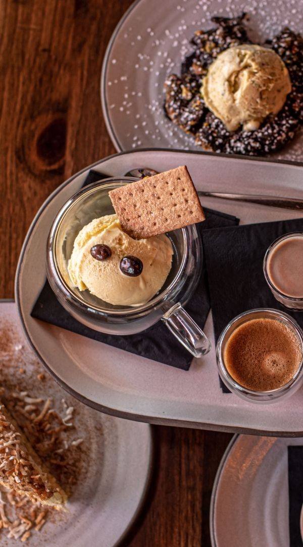 A Delicious Selection of Desserts, including Affogato, Coconut Crème Cake, and Warm Chocolate Cookie at Red Cork Bistro in Mukilteo A Delicious Selection of Desserts, including Affogato, Coconut Crème Cake, and Warm Chocolate Cookie at Red Cork Bistro in Mukilteo