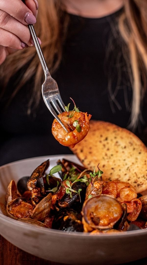 Mussels & Manila Clams in White Wine Broth with Homemade Garlic Bread at Red Cork Bistro in Mukilteo