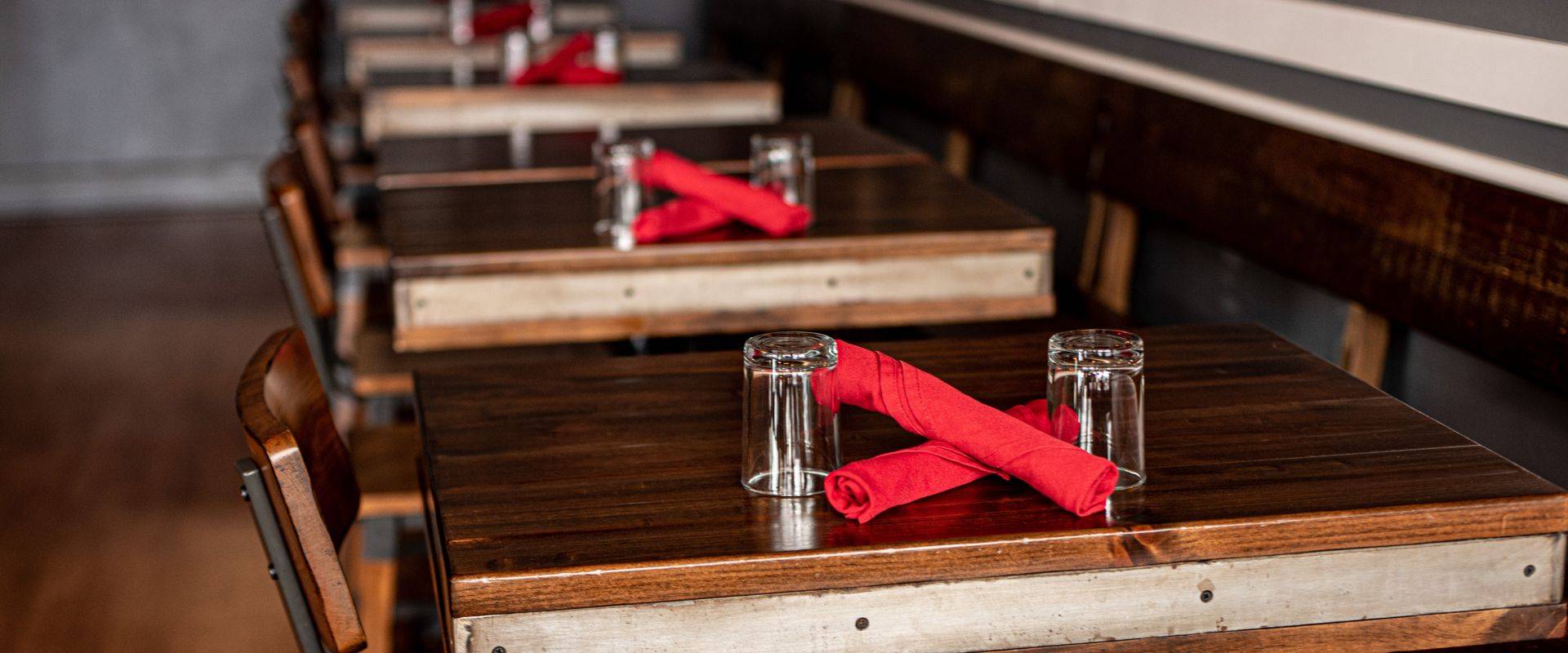 Red Cork Bistro offers an intimate dining experience, with tables, chairs, and benches, plus seating at the bar ... and red cloth napkins, of course.